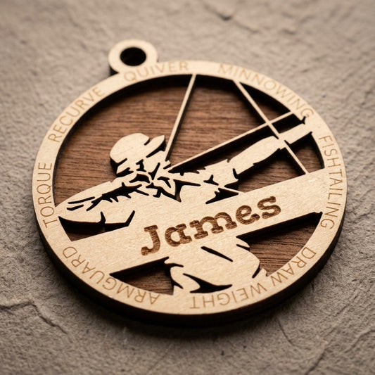 Personalized wooden archery ornament with custom laser engraving and the name James