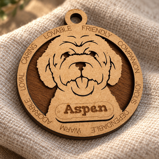 Personalized wooden dog ornament with engraved 'Aspen' name and dog traits on neutral fabric