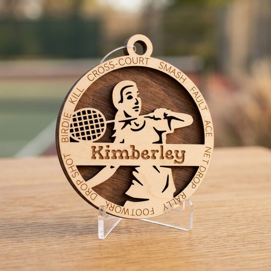 Personalized wood badminton ornament with player silhouette and custom name Kimberley on display stand